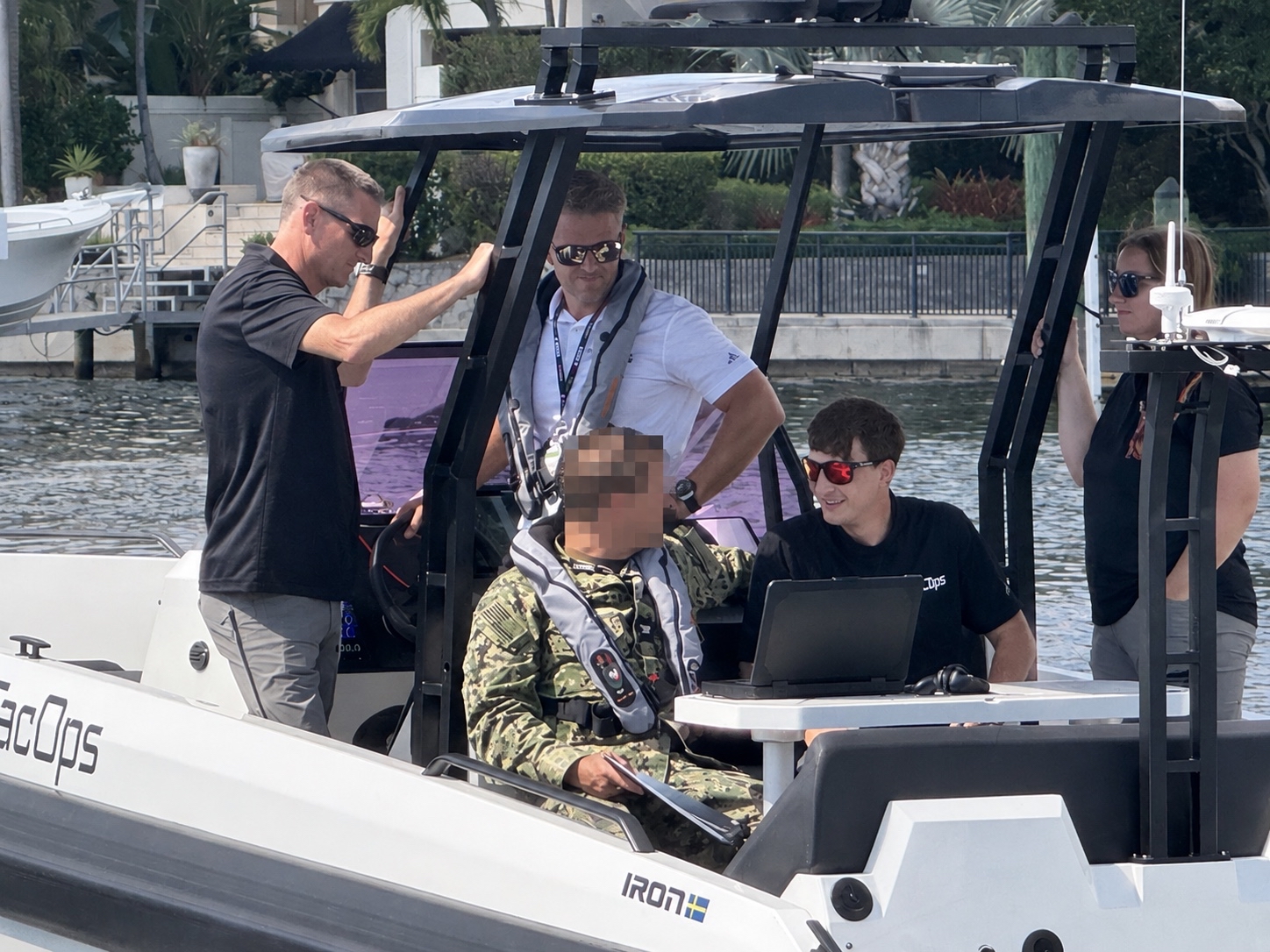 Operators and guests aboard a TacOps vessel during an on-water demonstration at SOF Week 2026 in Tampa