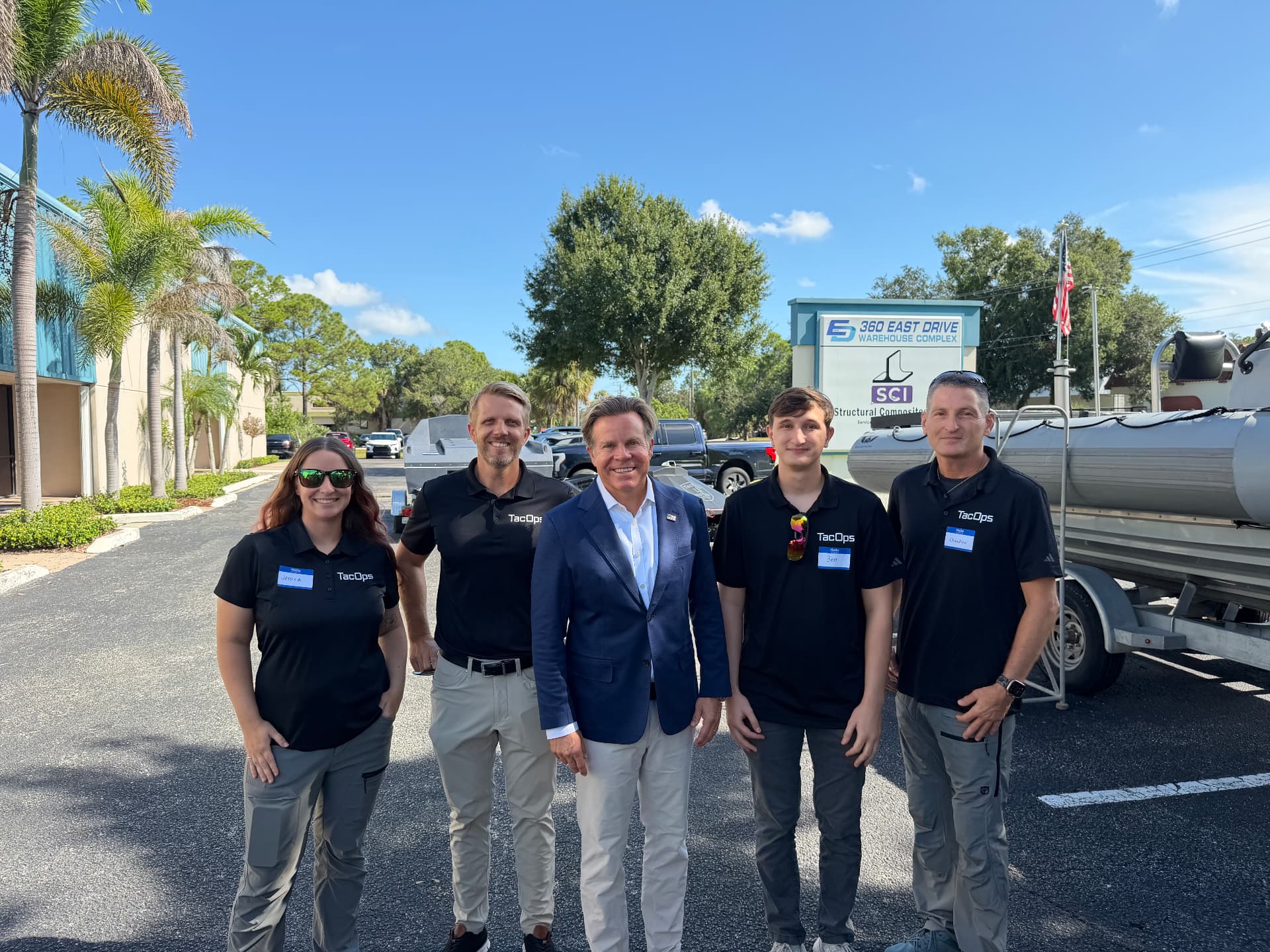 Congressman Mike Haridopolos with members of the TacOps Maritime Systems team during a visit to Structural Composites
